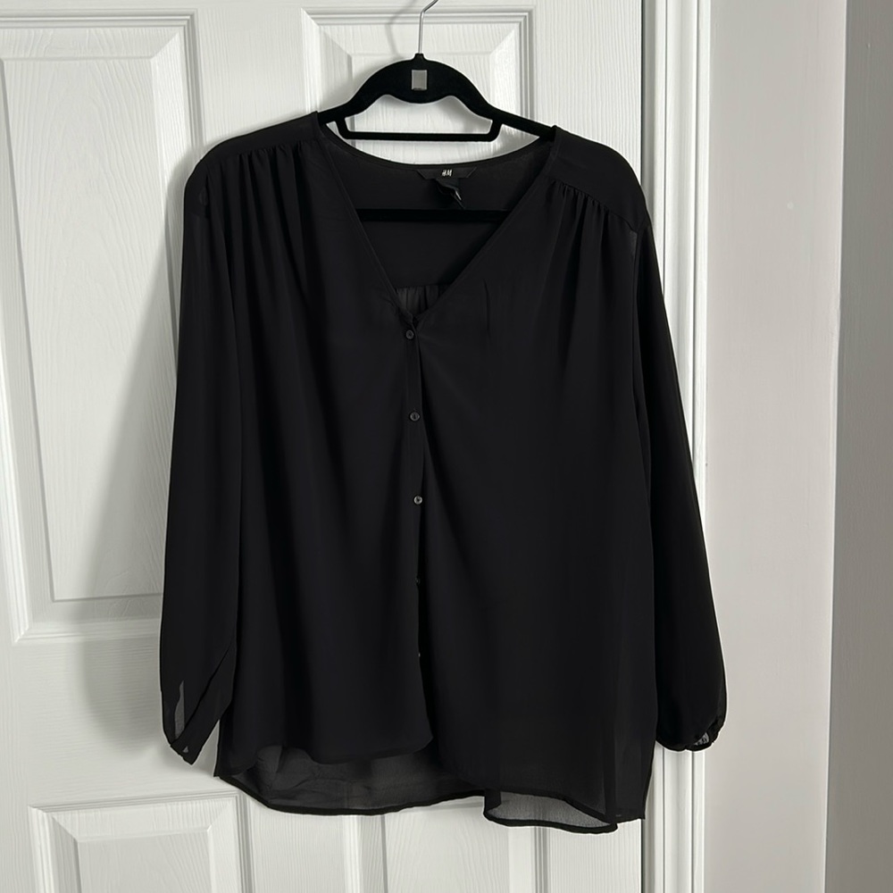 H & M sheer black 3/4 sleeve balloon sleeve button down v-neck top.